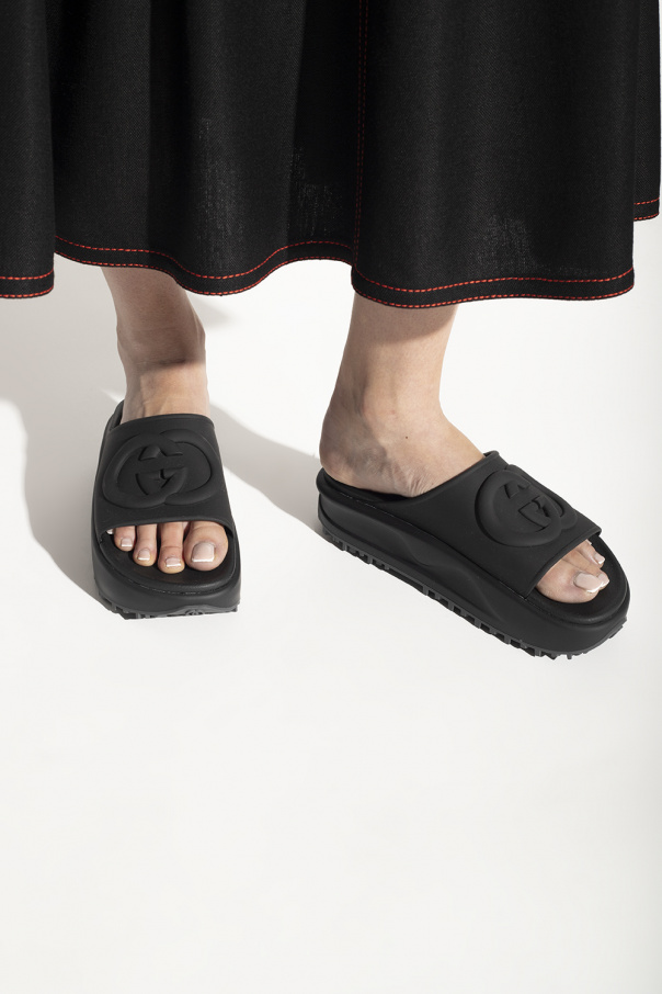 Black gucci cheap slides on feet